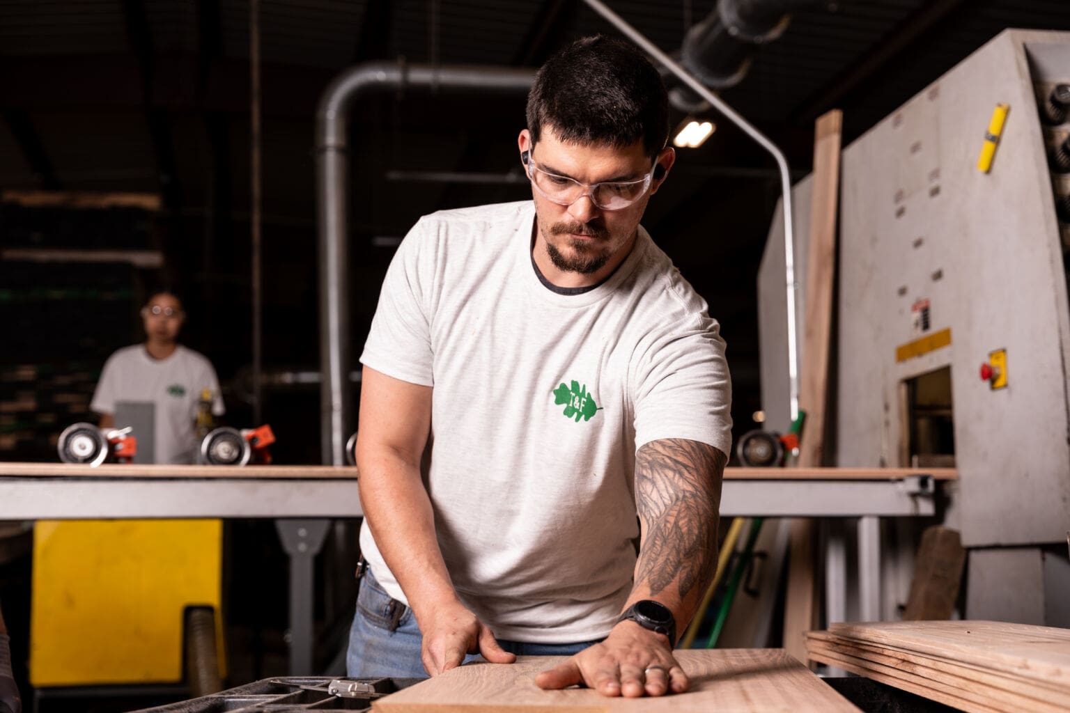 T&F Lumber craftsman preparing a board